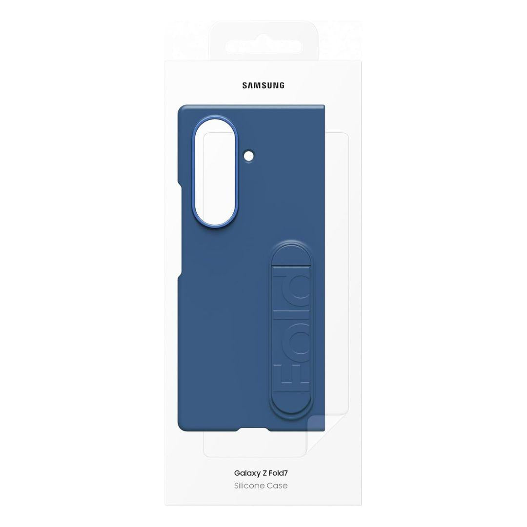 The Samsung Galaxy Fold 7 Silicone Case is shown in blue with a soft-touch finish and elongated camera cutout. Packaged in white retail box featuring Samsung branding, it offers slim, lightweight protection with raised “Fold” text on the case.