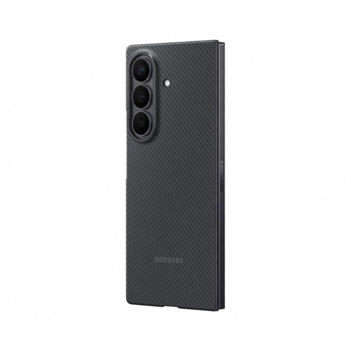 A black Samsung Galaxy Fold 7 with the Carbon Shield Case is shown partially open from the back, highlighting its ultra-slim carbon fiber protection, triple rear cameras with LED flash, and Samsung branding near the bottom.