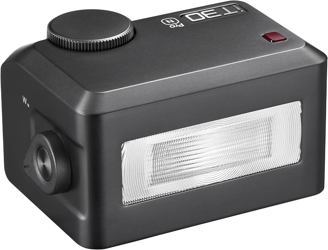 The MobileTechnica Godox iT30 Pro N for Nikon is a black rectangular camera flash with a textured top dial, red indicator light, large white flash panel, circular side connector port, and "PRO T30" in white letters.