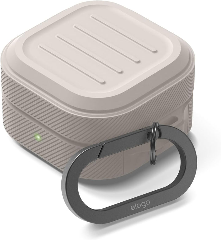 The MobileTechnica Premium Silicone Cover for Samsung Galaxy Buds 4 Pro & Buds 4 in Stone features a light gray, textured square case with a smooth ridged lid, green indicator light, and attached gray elago oval carabiner. Wireless charging supported.