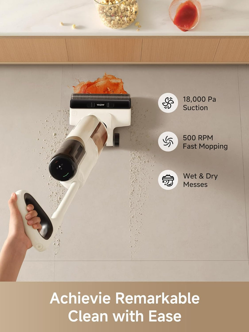A hand uses the MobileTechnica MOVA K30 Wet Dry Vacuum Cleaner with 18kPa suction and 500 RPM mopping to clean wet red spills and dry cereal from a light floor. Icons show it handles wet/dry messes. Text: "Achieve Remarkable Clean with Ease.