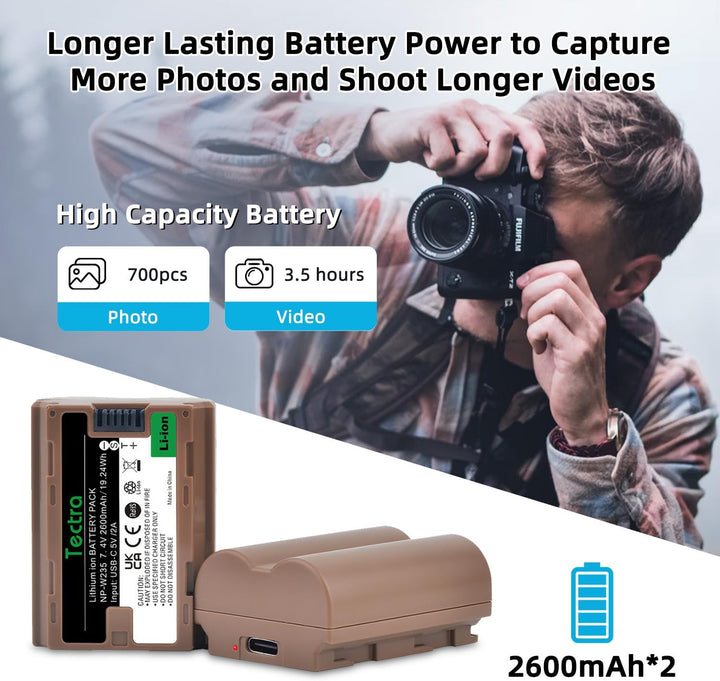 A man with a camera photographs outdoors against a sleek backdrop. Above, text reads: “Longer Lasting Battery Power to Capture More Photos and Shoot Longer Videos.” Two MobileTechnica Tectra NP-W235 2600mAh batteries are in the foreground.