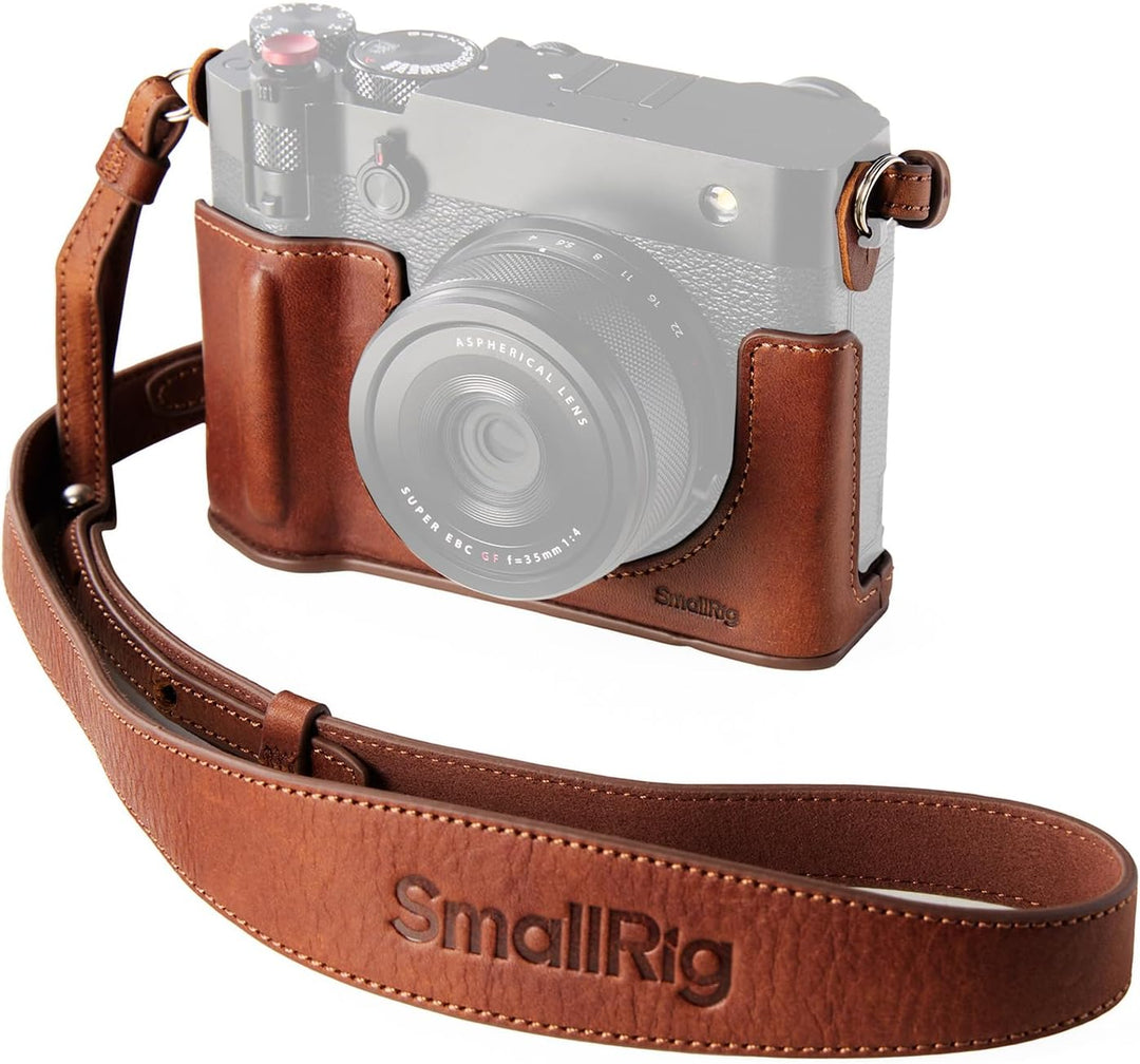 A brown SmallRig GFX100RF Leather Case Kit (5268), including leather case, shoulder strap, and concave shutter button cap for FUJIFILM GFX100RF, is shown fitted, offering stylish vintage protection with cutouts for controls and lens.