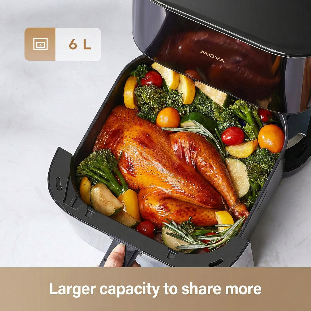 The MOVA FD10s Pro Air Fryer by MobileTechnica, with its 6-liter capacity, fits a whole roasted chicken, broccoli, potatoes, tomatoes, and apple slices—perfect for sharing family meals. Icon and caption: “Larger capacity to share more.”.
