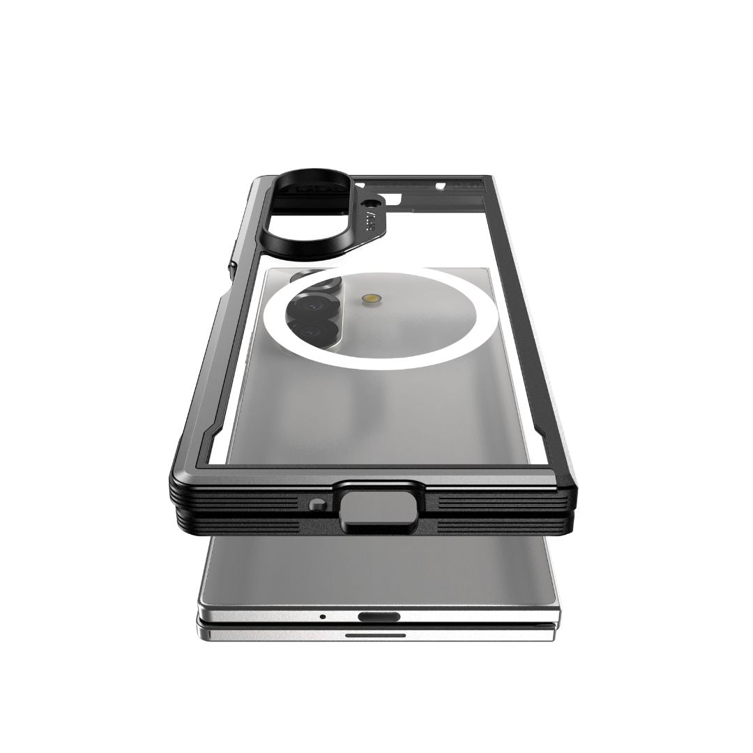 A clear RAPTIC Samsung Galaxy Fold 7 - Raptic Shield Black case with black edges sits above a silver phone, showcasing hinge protection, reinforced corners, raised camera ring, and precise cutouts for modern design and superior protection.