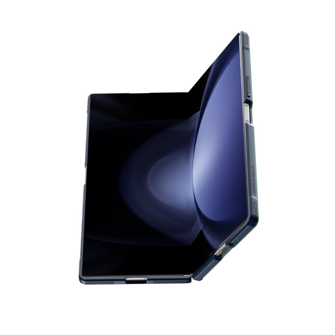 The MobileTechnica Samsung Galaxy Fold 7 with Raptic Shield Iridescent is partially open at 90 degrees, showcasing its sleek design, thin bezels, and metallic edges. The dark screen features a subtle blue gradient against a plain white background.