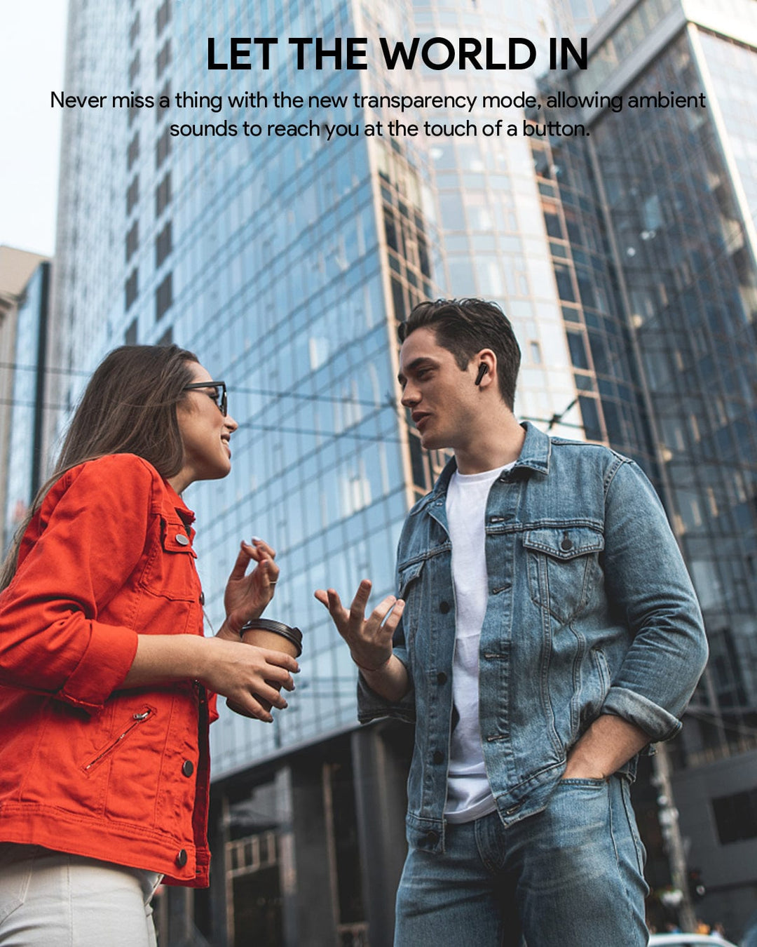 A woman in an orange jacket and a man in a denim jacket stand on a city street, smiling as he wears Aukey MiniNC Active Noise Cancelling Earbuds. Text above highlights "transparency mode" for clear sound and ambient awareness.