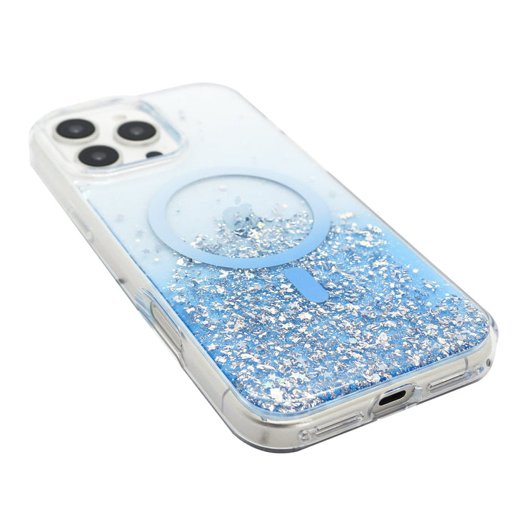 The Bryten Starburst MagSafe Case for iPhone 16 Pro, designed by Bryten, features a captivating blue gradient with glittery silver flakes that adorn the back. It showcases an anti-yellowing finish and includes a light blue circular MagSafe charging element centered around the Apple logo. The smartphone itself is equipped with a triple-lens camera system positioned in the top left corner.