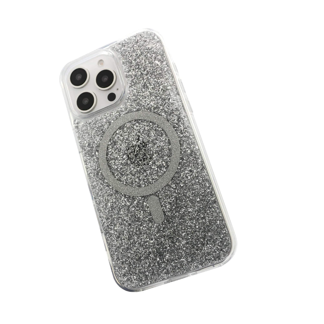 Introducing the Bryten Starburst MagSafe Case for iPhone 16 Pro from Bryten: a glitter-finished, silver case perfectly designed for a device featuring three rear camera lenses and one flash. This glamorous and sparkly case includes a central, raised circular charging area compatible with MagSafe and boasts anti-yellowing properties. Note that the phone within is not visible from this angle.