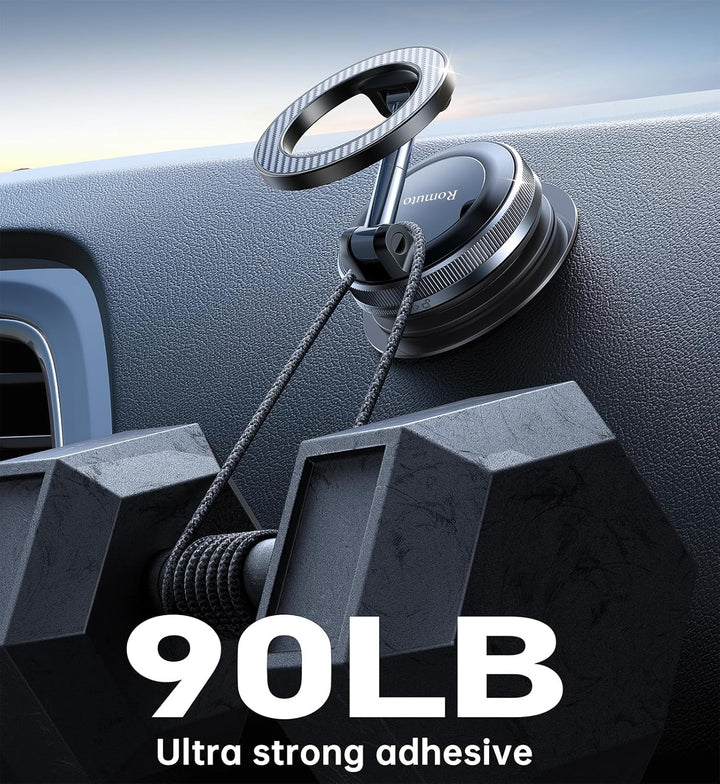 A MobileTechnica Samsung Galaxy S26 Ultra Case with MagSafe—Grey is shown mounted on a car dashboard with strong black adhesive. Two cords support a 90-pound hex dumbbell, demonstrating the ultra-strong adhesive power.