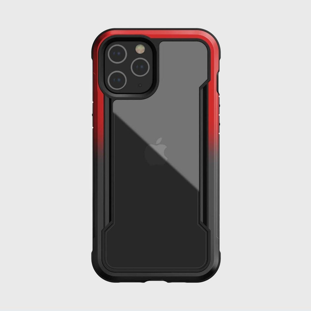 The black and red protective case for an iPhone, complete with three rear camera lenses, offers military-grade protection and has been drop tested for your peace of mind. The iPhone 12 Pro Max Case - Raptic Shield by Raptic ensures your device is secure and stylish.
