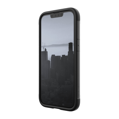 Smartphone with a black case displaying a black and white cityscape on its screen. The phone, a Raptic Shield iPhone 14 Series Case, stands upright against a plain background, boasting wireless charging compatibility.
