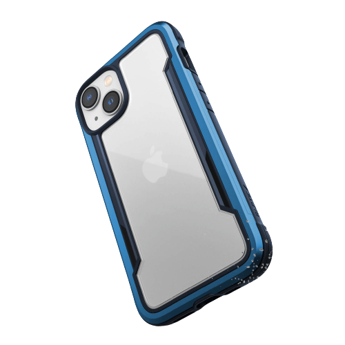 A clear case with blue edges encases a Raptic Shield iPhone 14 Series Case, displaying its Apple logo. The phone features a dual-camera setup on the back and offers wireless charging compatibility with 4-metre drop protection.