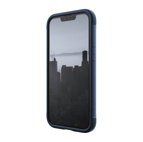 A smartphone with a blue Raptic Shield iPhone 14 Series Case displaying a monochrome image of a city skyline, boasting wireless charging compatibility and 4-metre drop protection.