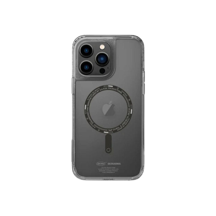 An iPhone 14 Pro Max with a gray back and three cameras is in a transparent, scratch-resistant SAIDO Case - Skinarma with design elements around the Apple logo, visible from the rear.