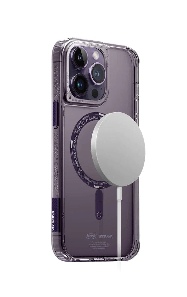 An iPhone 14 Pro Max SAIDO Case - Skinarma in a clear case with 360 full protection and scratch resistance, featuring a magnetic charging pad attached to the back. The phone has multiple camera lenses on the top left corner.